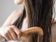 close-up-woman-combing-hair